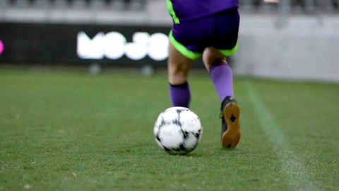 Soccer player practicing the Cruyff Turn
