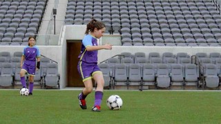 Soccer player practicing a step over, step 2