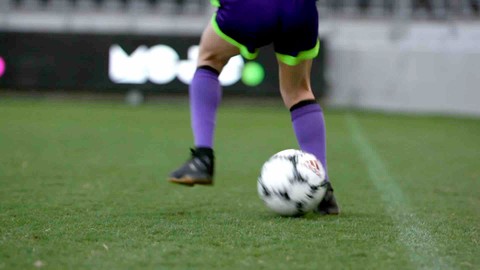 Soccer player practicing the Cruyff Turn